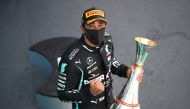 Formula One F1 - Spanish Grand Prix - Circuit de Barcelona-Catalunya, Barcelona, Spain - August 16, 2020 Winner Mercedes' Lewis Hamilton celebrates on the podium Pool via REUTERS/Bryn Lennon