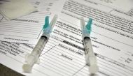 In this file photo taken on January 10, 2013, two syringes containing flu vaccine are ready at the Whitman-Walker Health Clinic in Washington, DC. Global influenza vaccine makers have produced a record number of doses for the coming flu season, as authori