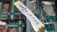 Frozen seafood products made of imported shrimps are seen inside a sealed freezer at a supermarket following a new outbreak of the coronavirus disease (COVID-19) in Beijing, China June 19, 2020. REUTERS/Carlos Garcia Rawlins/File Photo