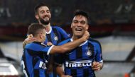 Inter Milan's Argentinian forward Lautaro Martinez (R) celebrates scoring the 3-0 with his teammates during the UEFA Europa League semi-final football match Inter Milan v Shakhtar Donetsk on August 17, 2020 in Duesseldorf, western Germany. / AFP / POOL / 