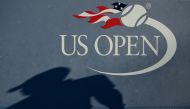 (FILES) In this file photo the shadow of an umpire is seen on the wall as Daniel Evans of the United Kingdom plays against Stan Wawrinka of Switzerland in their 2016 Us open men's single match at the USTA Billie Jean King National Tennis Center in New Yor