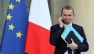(FILES) In this file photo taken on January 24, 2018 French Junior Minister for Public Administration Olivier Dussopt leaves the Elysee presidential palace after a weekly cabinet meeting in Paris. / AFP / LUDOVIC MARIN