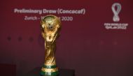 The FIFA World Cup trophy is seen prior to the Concacaf preliminary draw for the World Cup qatar 2022 football tournament at the Home of FIFA in Zurich on August 19, 2020. / AFP / FIFA / Kurt SCHORRER 
