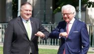 U.S. Secretary of State Mike Pompeo and Polish Foreign Minister Jacek Czaputowicz greet each other with an elbow bump in Lazienki Palace in Warsaw, Poland, August 15, 2020. Janek Skarzynski/Pool via REUTERS