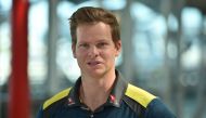 Australian cricketer Steve Smith talks to the media at Sydney airport on August 23, 2020. Australian coach Justin Langer said his Australia squad are super-fit and ready to hit the ground running ahead of departing for a white-ball tour of England, their 