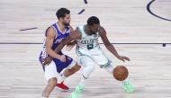 Boston Celtics guard Kemba Walker (8) dribbles as Philadelphia 76ers guard Raul Neto (19) defends during the second half in game four of an NBA basketball first-round playoff series at The Field House.  Kim Klement-USA TODAY Sports