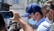 Manchester United football team captain Harry Maguire leaves a courthouse on the Greek island of Syros, the administrative hub of the Cycladic island group that includes Mykonos on August 22, 2020.   AFP / EUROKINISSI
