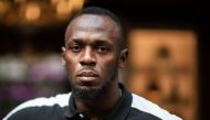 In this file photo taken on May 15, 2019 Jamaican Olympic sprinter Usain Bolt poses during a photo session as he launches a new brand of electric scooters named 