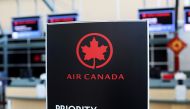 FILE PHOTO: Air Canada signage is pictured at Vancouver's international airport in Richmond, British Columbia, Canada, February 5, 2019. REUTERS/Ben Nelms/File Photo
