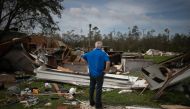 Lonnie Gatte returns to find his destroyed residence in the aftermath of Hurricane Laura in Sulphur, Louisiana, U.S., August 27, 2020. REUTERS/Adrees Latif