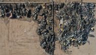 TOPSHOT - An aerial view taken on August 26, 2020, shows imported vehicles damaged at the port of Beirut in the August 4 massive explosion that caused severe damage across swathes of the Lebanese capital, killed at least 181 people, injured more than 6,50