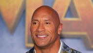 In this file photo taken on December 9, 2019 US actor Dwayne Johnson arrives for the World Premiere of 