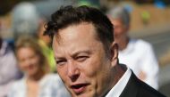 Tesla CEO Elon Musk talks to media as he arrives to visit the construction site of the future US electric car giant Tesla, on September 03, 2020 in Gruenheide near Berlin. Tesla builds a compound at the site in Gruenheide in Brandenburg for its first Euro