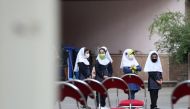 Iranian students wearing mask are seen in school after the Ministry of Education of Iran plans the opening of schools and education to be done remotely in some schools according to the coronavirus (Covid-19) risk level in Tehran, Iran, September 05, 2020.