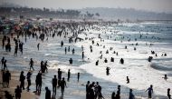 People crowd the beach on the record heat wave, amid the global outbreak of the coronavirus disease (COVID-19), in Santa Monica, California, U.S., September 6, 2020. REUTERS/Ringo Chiu
