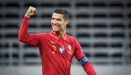 Portugal's forward Cristiano Ronaldo celebrates scoring the opening goal, his 100th goal for Portugal, during the UEFA Nations League football match between Sweden and Portugal on September 8, 2020 in Solna, Sweden. / AFP / TT NEWS AGENCY / Janerik HENRIK