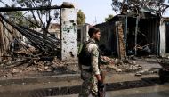 An Afghan security forces member inspects at the site of a blast in Kabul, Afghanistan September 9, 2020. REUTERS/Mohammad Ismail