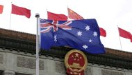 FILE PHOTO: The Australian flag flutters in front of the Great Hall of the People during a welcoming ceremony for Australian Prime Minister in Beijing, China, April 14, 2016. Reuters/Jason Lee/File Photo 
