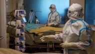 Medical workers take care of patients suffering from the coronavirus disease (COVID-19), at the Intensive Care Unit (ICU) of the Max Smart Super Speciality Hospital in New Delhi, India, September 5, 2020.