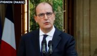 This image of a television screen shows French Prime Minister Jean Castex as he speaks on the coronavirus Covid-19 situation during a press conference at The Hotel Matignon in Paris on September 11, 2020. / AFP / Thomas COEX