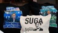 Merchandise featuring Japan's expected new prime minister Yoshihide Suga are displayed at designer Ippei Fujita's store Marble in Yuzawa, Akita Prefecture, Japan, September 11, 2020. Picture taken on September 11, 2020. REUTERS/Chris Gallagher