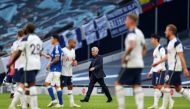 Tottenham Hotspur's Portuguese head coach Jose Mourinho (C) walks on to the pitch at the end of the game during the English Premier League football match between Tottenham Hotspur and Everton at Tottenham Hotspur Stadium in London, on September 13, 2020. 