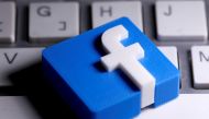 A 3D-printed Facebook logo is seen placed on a keyboard in this illustration taken March 25, 2020. REUTERS/Dado Ruvic/Illustration/File Photo