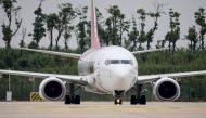 In this photo taken on September 16, 2020, a Boeing 737-800 operated by South Korean carrier T'way taxis after landing at Wuhan's Tianhe International Airport in China's central Hubei province. China's Wuhan, ground zero for the coronavirus outbreak which