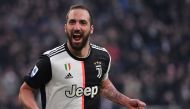In this file photo taken on January 06, 2020 Juventus' Argentinian forward Gonzalo Higuain celebrates after scoring during the Italian Serie A football match Juventus vs Cagliari at the Juventus Allianz stadium in Turin. Argentine striker Gonzalo Higuain 