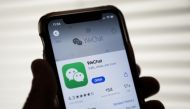 In this file photo illustration taken on August 07, 2020, the WeChat app is displayed in the App Store on an Apple iPhone in Washington, DC. US officials on September 18, 2020, ordered a ban on downloads of the popular Chinese-owned mobile applications We