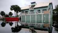A house surrounded by flood waters is pictured after Hurricane Sally in Gulf Shores, Alabama. REUTERS/Jonathan Bachman/File Photo