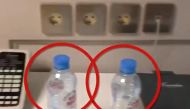 This grab taken from a video posted on September 17, 2020 on the Instagram account of @navalny shows bottles of Svyatoi Istochnik, or Holy Spring, mineral water, in the hotel room where opposition leader Alexei Navalny stayed during his visit to the Siber