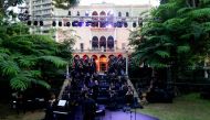 Musicians and choir singers prepare to perform at a concert for the victims of August's deadly Beirut blast in the gardens of the damaged 19th-century Sursock Palace in Achrafieh in the Lebanese capital on September 20, 2020. / AFP / ANWAR AMRO
