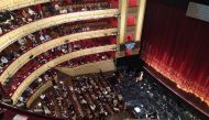Spectators attend an opera performance which was called off after complaints over lack of social distancing, amid the outbreak of the coronavirus disease (COVID-19), at Royal Theatre in Madrid, Spain, September 20, 2020, in this picture obtained from soci