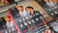 FILE PHOTO: Copies of 'Finding Freedom', an unofficial biography on Prince Harry and Meghan Markle, the Duke and Duchess of Sussex, are seen on display at a Waterstones bookshop in London, Britain August 12, 2020. REUTERS/Toby Melville/File Photo