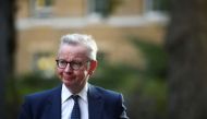 Britain's Chancellor of the Duchy of Lancaster Michael Gove walks outside Downing Street in London, Britain, September 22, 2020. REUTERS/Hannah McKay