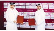 QSL's Hassan Rabiah Al Kuwari and Khaled Ali Al Mawlawi of Aspetar after signing the agreement yesterday. 