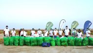 Volunteers from Abdullah Abdulghani & Bros. Co. and Doha Environmental Action Projects during the clean-up drive organised to mark the World Cleanup Day.
