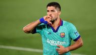 In this file photo taken on July 05, 2020 Barcelona's Uruguayan forward Luis Suarez celebrates after scoring a goal during the Spanish League football match between Villarreal and Barcelona at the Madrigal stadium in Villarreal. Atletico Madrid announced 