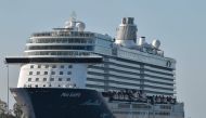 Maltese-flagged cruiser Mein Schiff 6, operated by German travel giant TUI is docked at the port of Piraeus early on September 29, 2020 after a dozen crew members were reported positive for the virus, state news agency ANA said. / AFP / LOUISA GOULIAMAKI