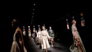 Models present creations by designer Maria Grazia Chiuri as part of her Spring/Summer 2021 ready-to-wear collection show for fashion house Dior during Paris Fashion Week in Paris, France, September 29, 2020. REUTERS/Benoit Tessier
