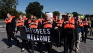 (FILES) In this file photo taken on October 15, 2019 activists hold a civil disobedience protest against 