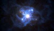 A handout photo made available on September 29, 2020 by the European Southern Observatory shows an artist's impression of the central black hole and the galaxies trapped in its gas web./ AFP / European Southern Observatory / L. CALCADA /