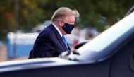 US President Donald Trump arrives at Walter Reed National Military Medical Center by helicopter after the White House announced that he 