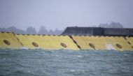 Mose flood barrier scheme is used for the first time, in Venice, Italy, October 3, 2020. REUTERS/Manuel Silvestri