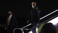 Democratic presidential nominee Joe Biden steps off of his campaign airplane after returning from Grand Rapids, Michigan, at New Castle County Airport October 2, 2020 in New Castle, Delaware. Chip Somodevilla/AFP