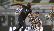 In this file photo taken on September 26, 2020 FC Porto's Portuguese midfielder Danilo Pereira (L) vies with Boavista's Brazilian forward Gustavo Sauer during the Portuguese league football match Boavista FC against FC Porto at the Estadio do Bessa Seculo