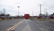 FILE PHOTO: An empty border crossing is seen leading into Rouses Point, NY at the U.S.-Canada border crossing in Lacolle, Quebec, Canada March 19, 2020. REUTERS/Christinne Muschi/File Photo
