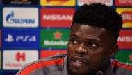 In this file photo taken on March 10, 2020 Atletico Madrid's Ghanaian midfielder Thomas Partey attends a press conference at Anfield stadium in Liverpool, north west England. Arsenal's move for Atletico Madrid midfielder Thomas Partey is expected to be th