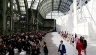Models present creations by designer Virginie Viard as part of her Spring/Summer 2021 ready-to-wear collection show for fashion house Chanel during Paris Fashion Week in Paris, France, October 6, 2020. REUTERS/Benoit Tessie